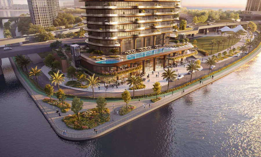 Golden hour over the waterfront promenade and pool terrace at Jumeirah Residences Al Maryah Island