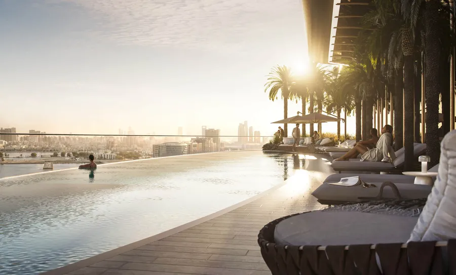 Infinity pool at sunset at Jumeirah Residences Al Maryah Island, overlooking the Abu Dhabi skyline