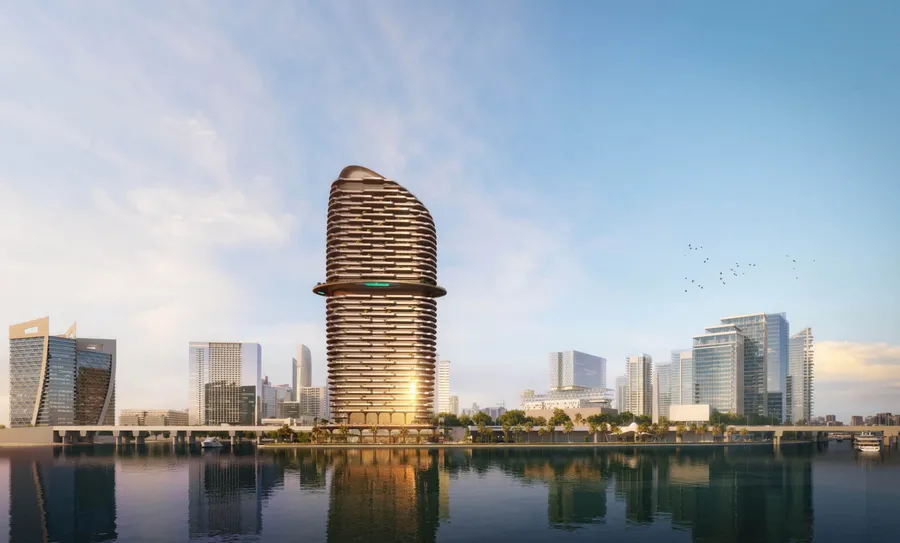 Jumeirah Residences Al Maryah Island seen across the canal against the Abu Dhabi skyline
