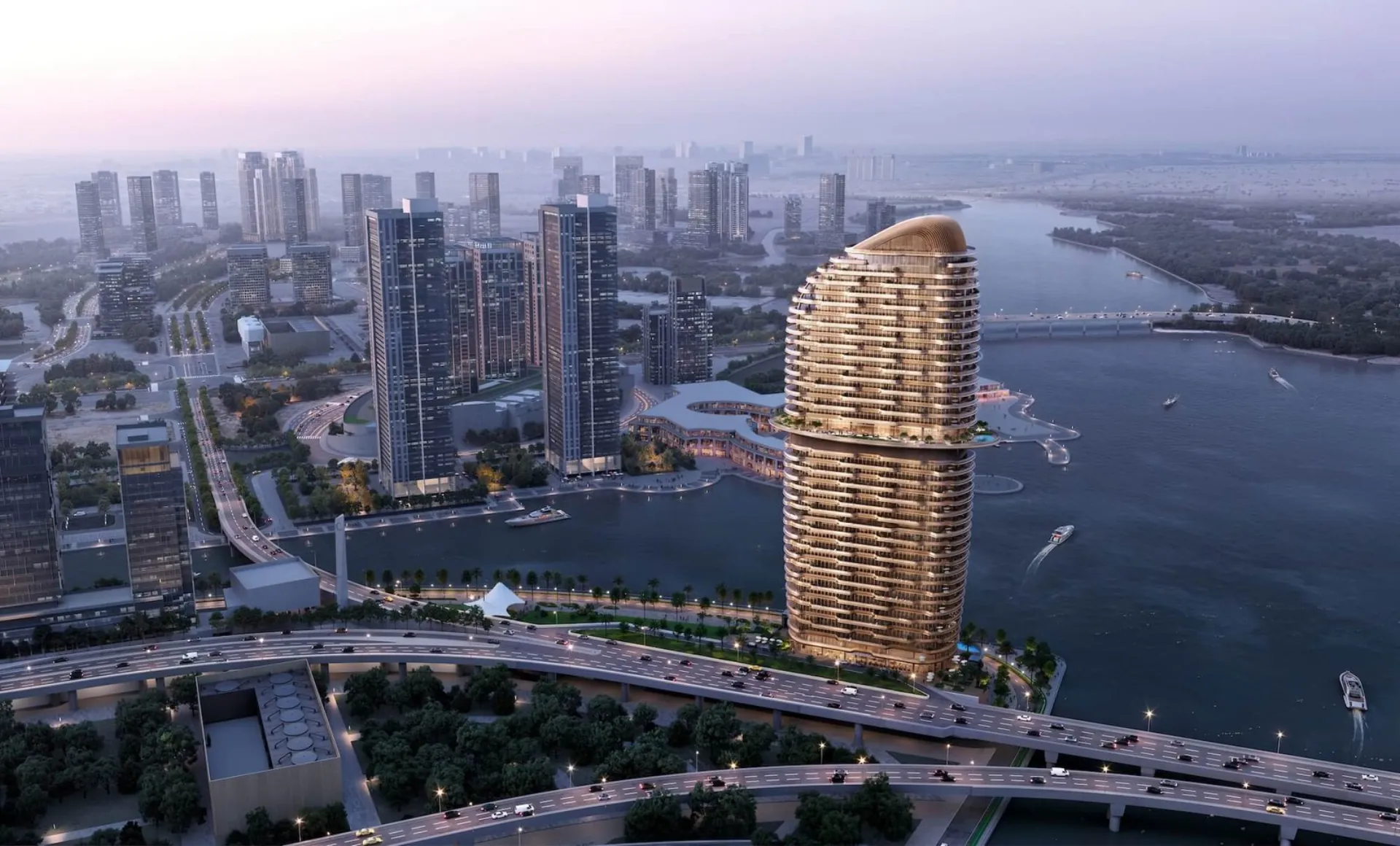 Sunset skyline view of the amber-toned Jumeirah Residences tower above the Al Maryah Island canal